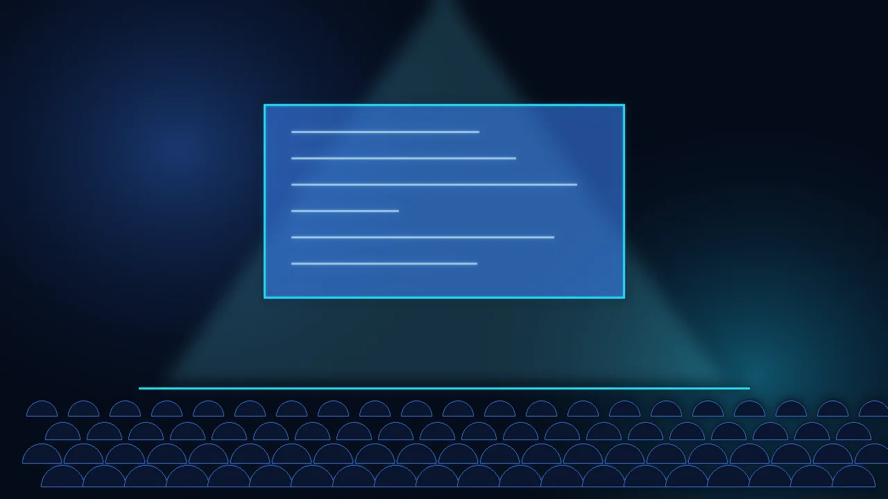 Conference stage with a lit screen facing rows of seats